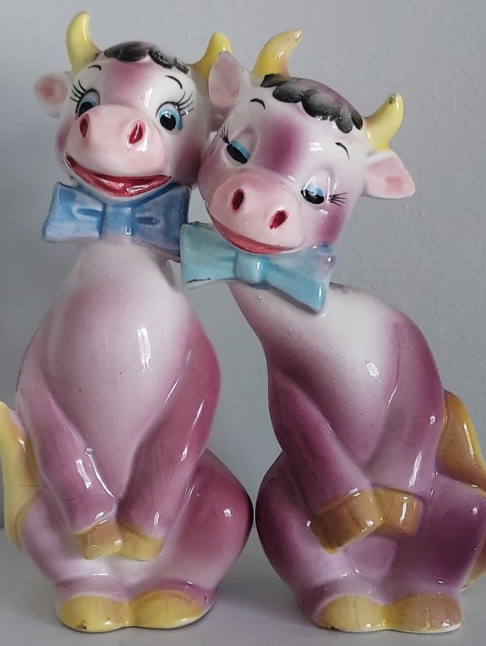 Pink Ceramic Cow Figurine Duo with Blue Bows